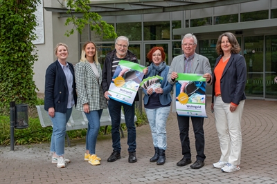 Team Wohngeld präsentiert Flyer Wohngeld plus